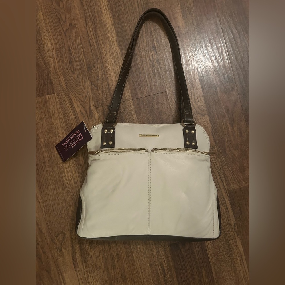 brown and tan with gold accent purse